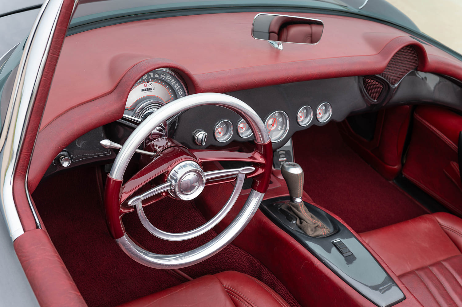 15 1956 Corvette steering wheel and dash with burgundy wrap billet shifter and round gauge cluster