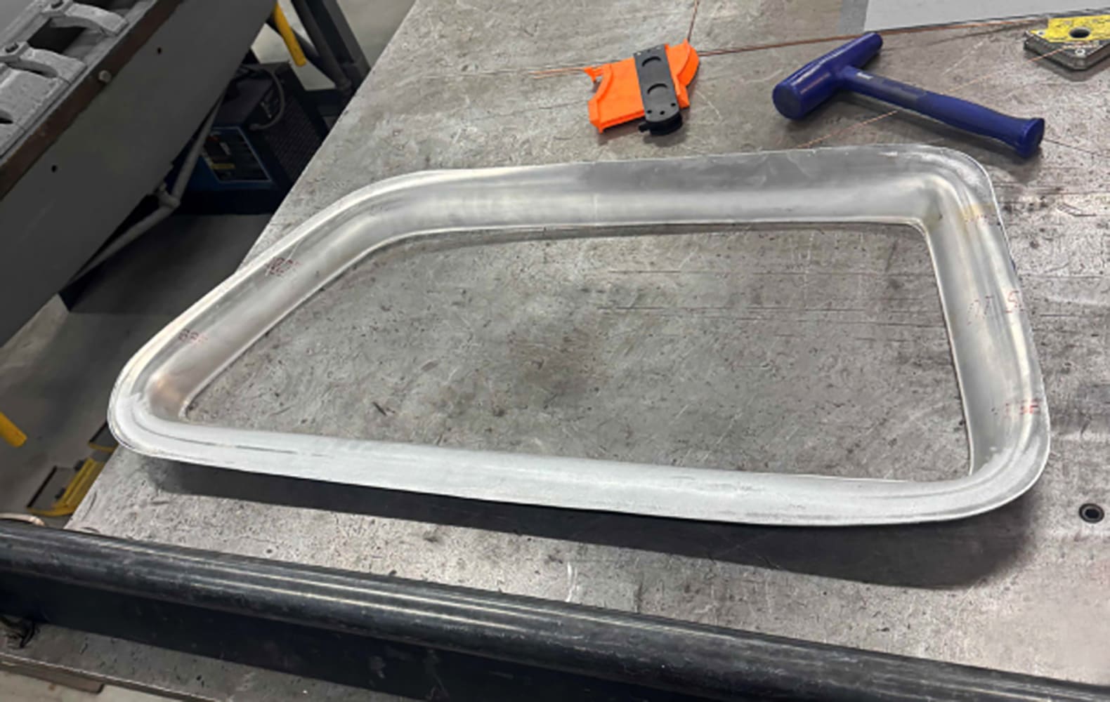 15 Divco raw formed window trim ring fresh from die press with uniform curvature and edge flange