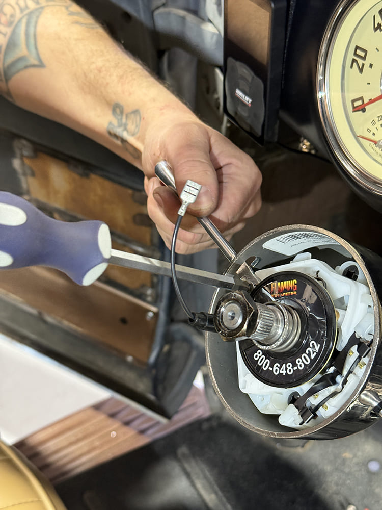 16 1948 Chevy truck Flaming River column signal wire plug close up install phase