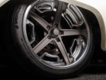 16 1966 Chevrolet Suburban close up of HRE 5 spoke wheel with Continental Sport Plus+ tire and 4 piston caliper
