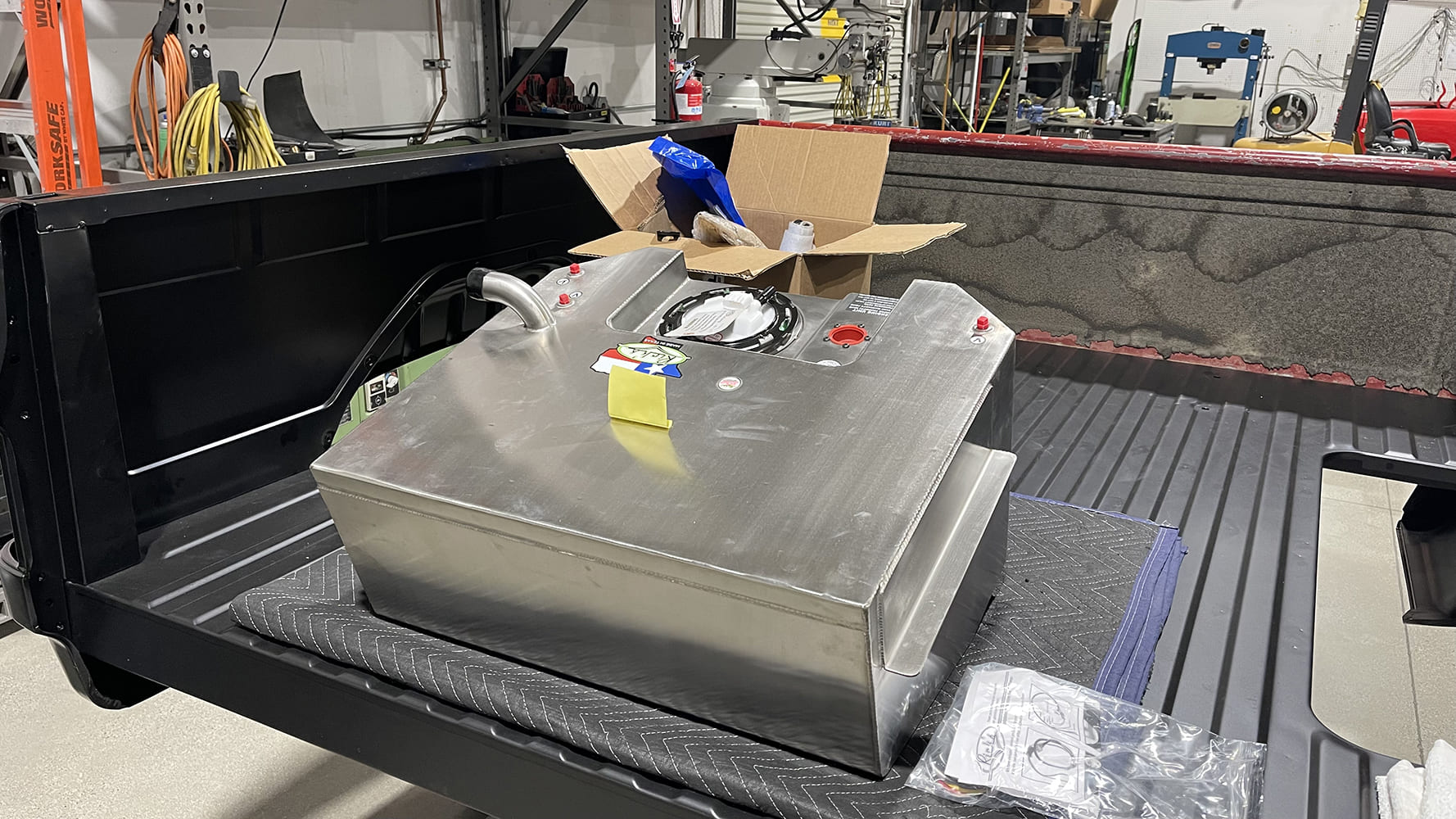 16 1985 chevy squarebody custom aluminum fuel cell mocked up in bed with sending unit installed