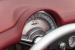 17 1956 Corvette Classic Instruments 140 mph speedometer with Corvette crossed flags logo and burgundy dash wrap