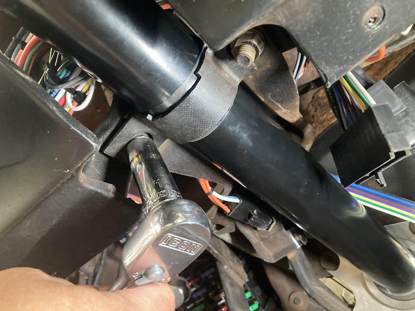 17 1964 Pontiac GTO tilt column tightened under dash using 716” ICON socket and factory bracket