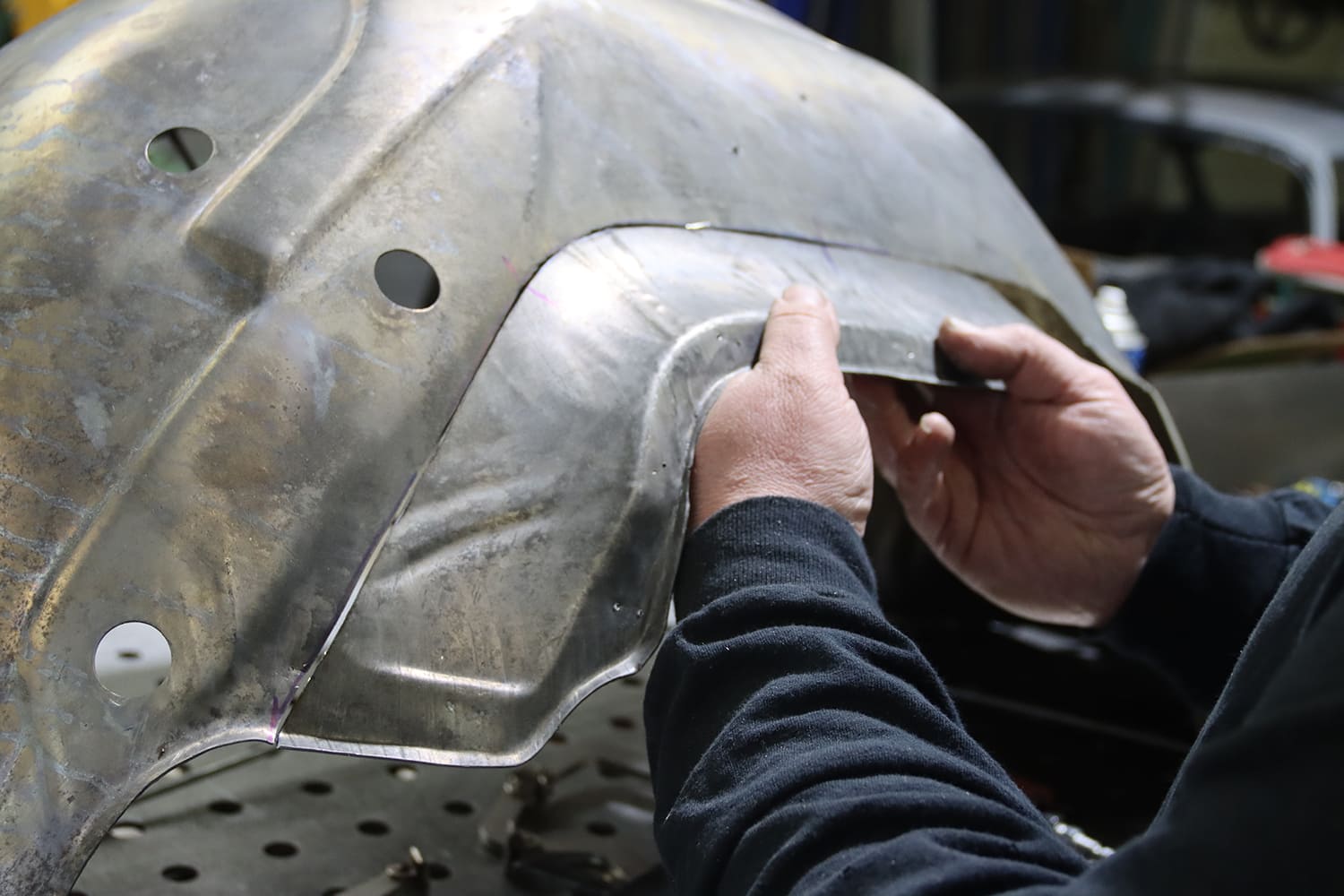 17 1967 Firebird wheel tub patch panel hand fitted for contour matching before welding in place