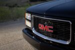 18 1996 gmc obs close up front grill red gmc emblem chrome surround black finish