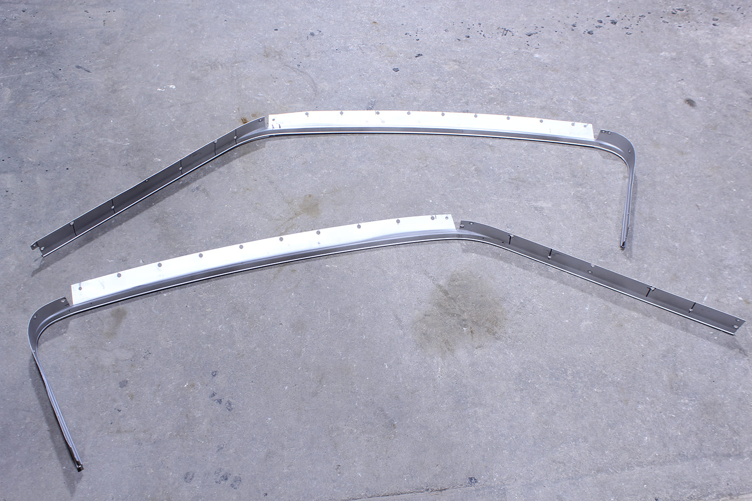 19 Replacement roof drip rails fabricated with pre punched weld holes and reinforcement plates