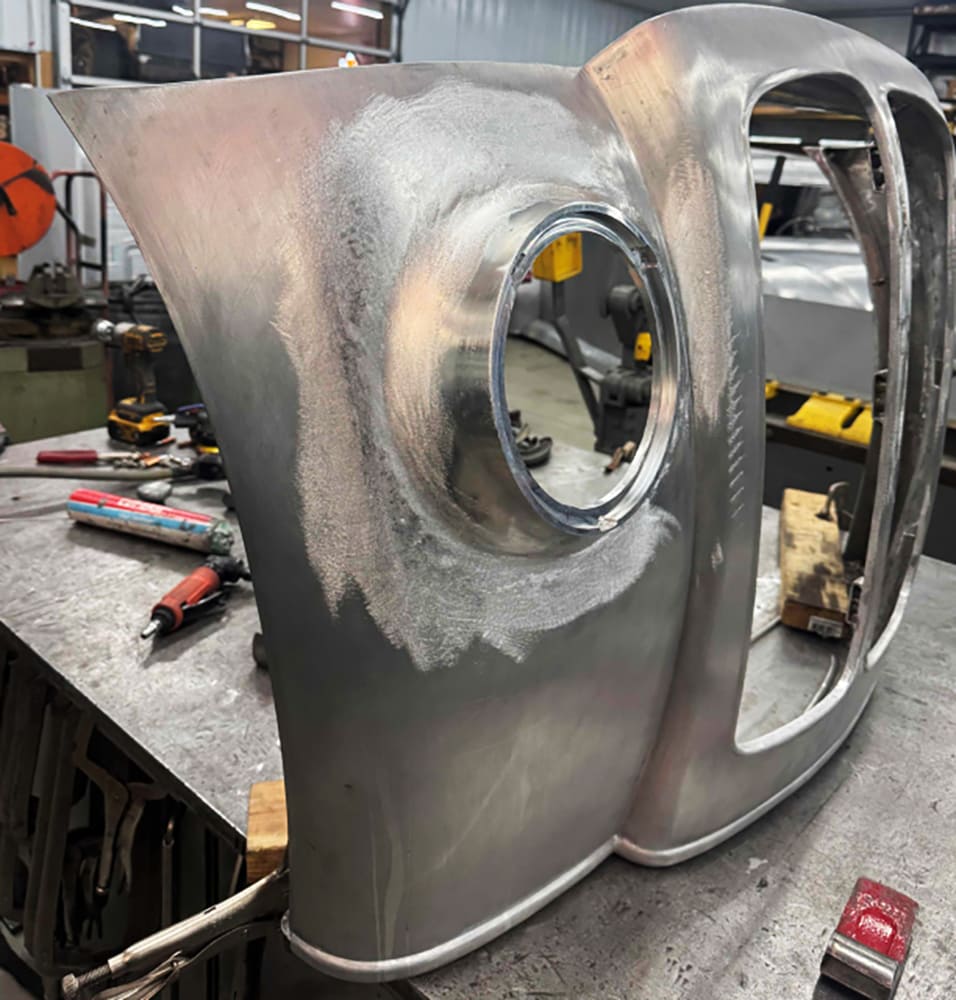 24 Divco headlight recess finished with ring edge blended into fender face for seamless look