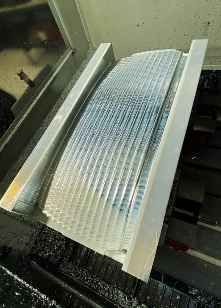 25 Divco billet headlight lens mold machined with vertical fluting channels and surface refinement