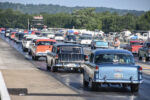 25 Long line of classic Tri Five Chevrolets on drag strip