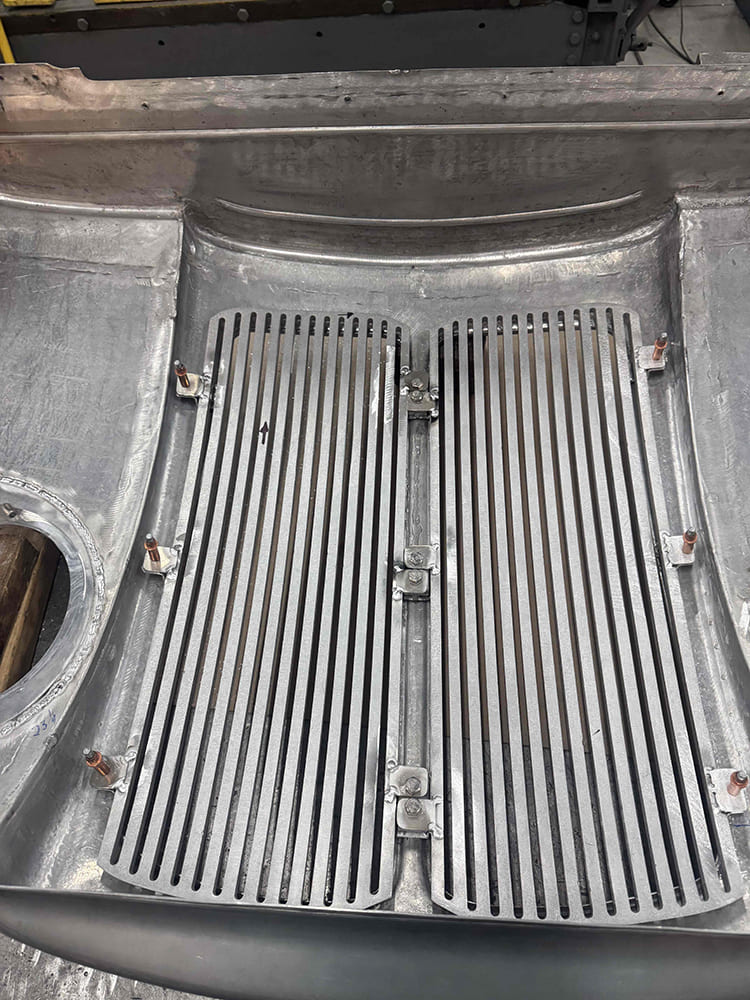 29 Divco twin vent grille panels mounted in cowl with cleco fasteners and curved recess fitment