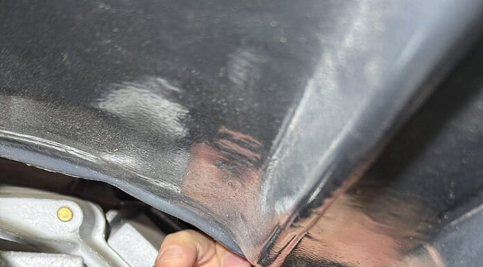 00 Pure Stealth transmission line install hand routing braided hose to trans fitting