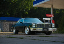 001 1977 Chevy Malibu SS front view chrome bumper gas station