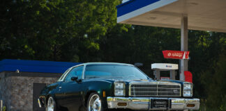 001 1977 Chevy Malibu SS front view chrome bumper gas station