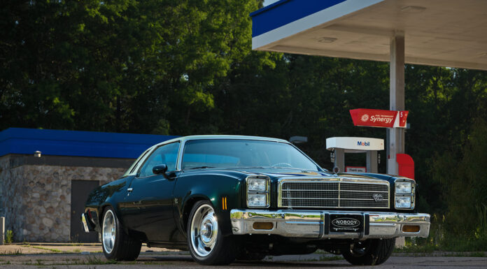 001 1977 Chevy Malibu SS front view chrome bumper gas station