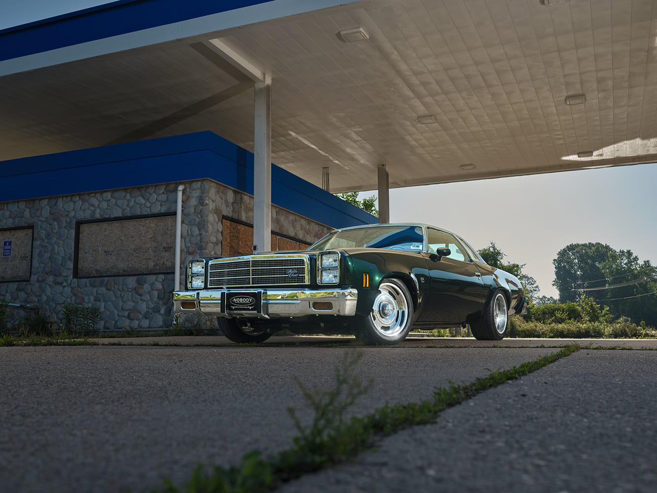 002 1977 Chevy Malibu low stance chrome wheels Mobil station