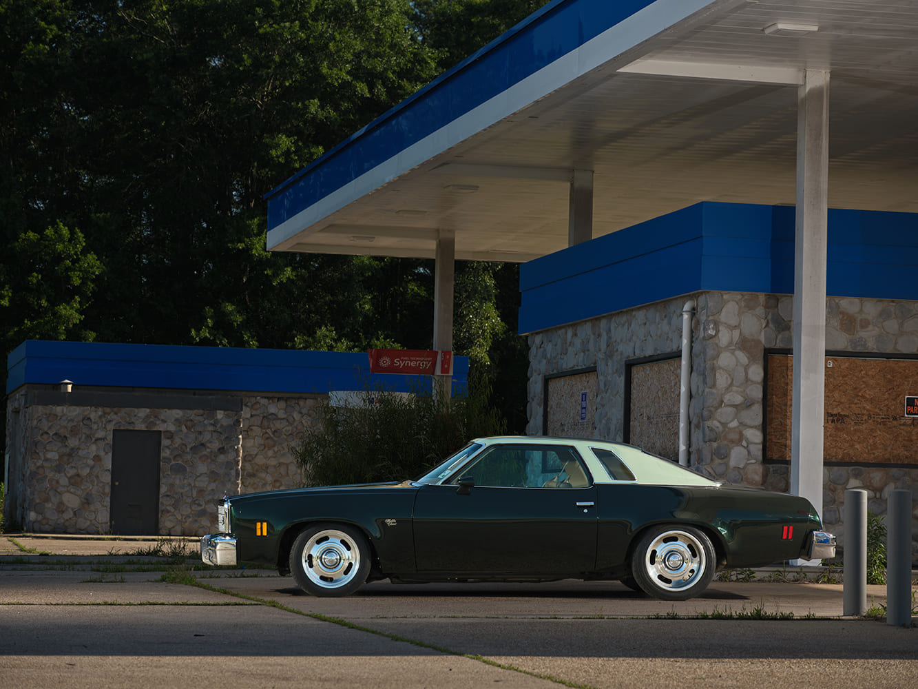 006 1977 Chevy Malibu side profile white top chrome trim