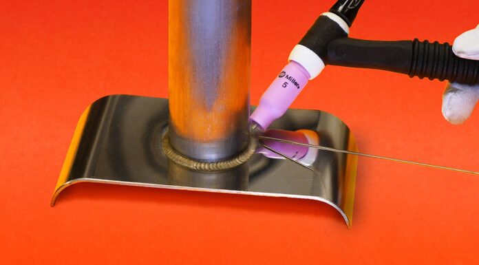 01 TIG torch with #5 pink cup tungsten on steel joint clean weld bead