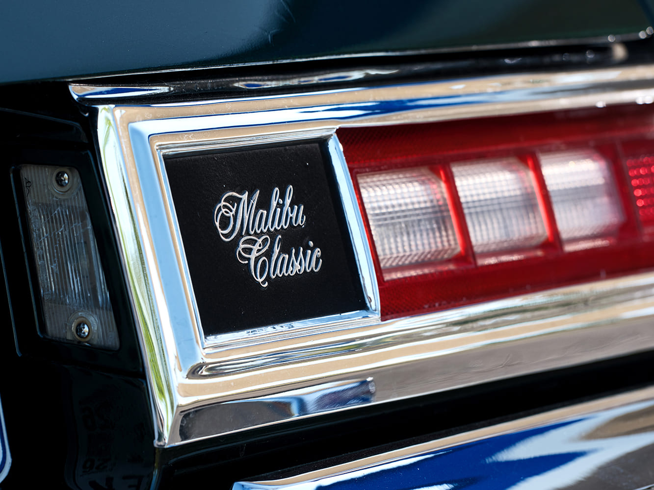 016 1977 Chevy Malibu Classic emblem rear taillight close up