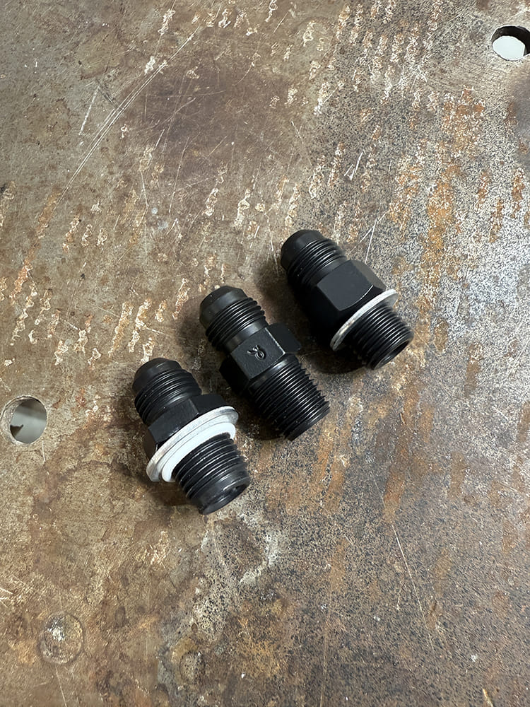 02 Pure Stealth AN fittings three piece black finish straight thread adapters