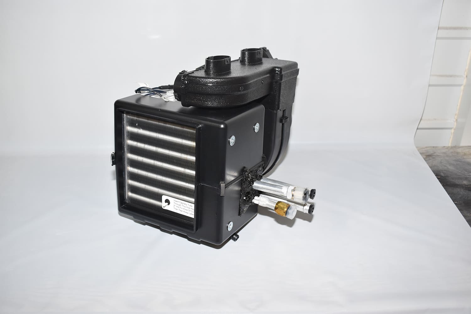 03 1951 Chevy AC evaporator core ports heater core lines front view HVAC unit