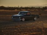 05 1972 Chevrolet C10 three quarter view black lowered truck red interior desert cactus