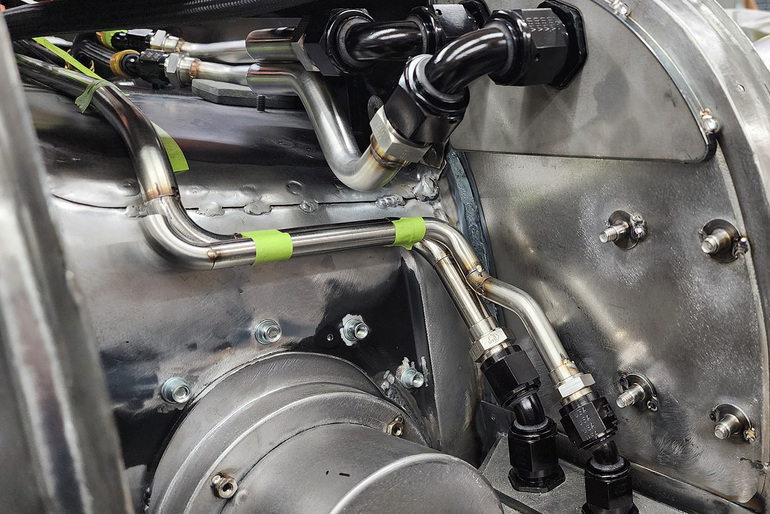 05 Test fitted hard lines green tape securing multi angle bends AN fittings