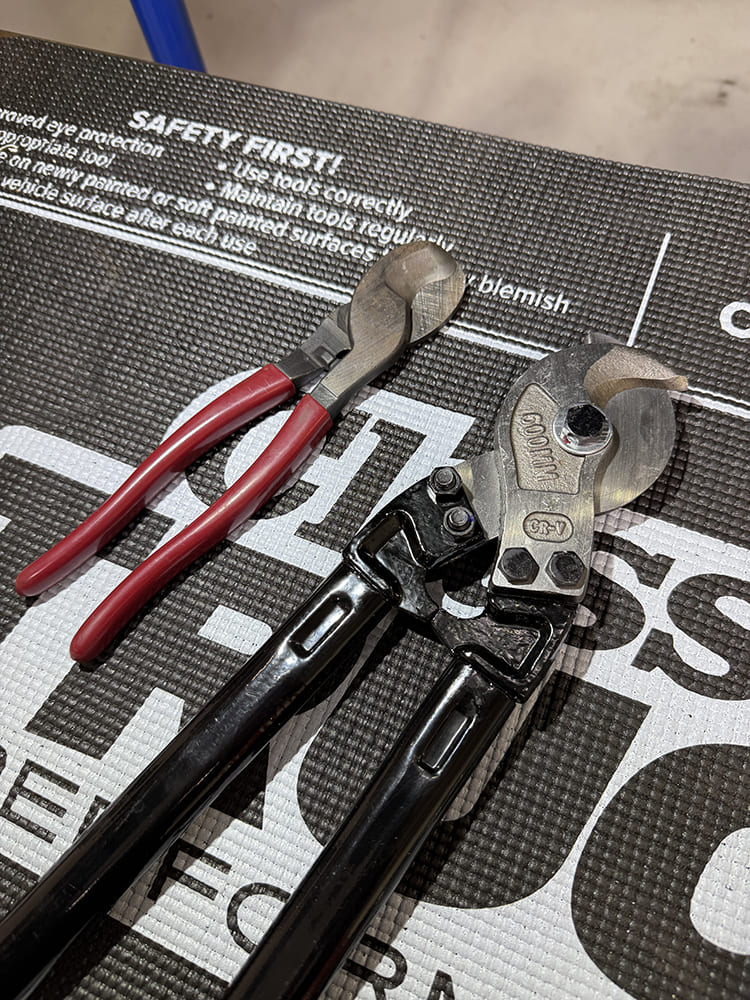 08 Cutting braided hose close up of snips and crimper tools for transmission lines