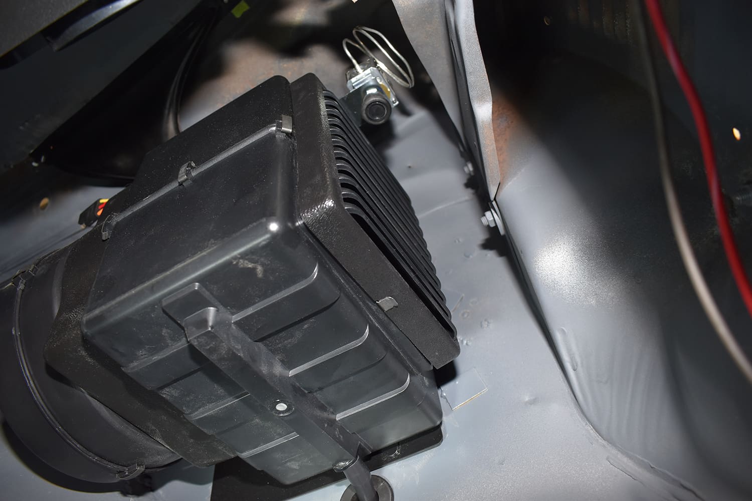 09 1951 Chevy AC floor vent grille mounted to underdash HVAC housing interior view