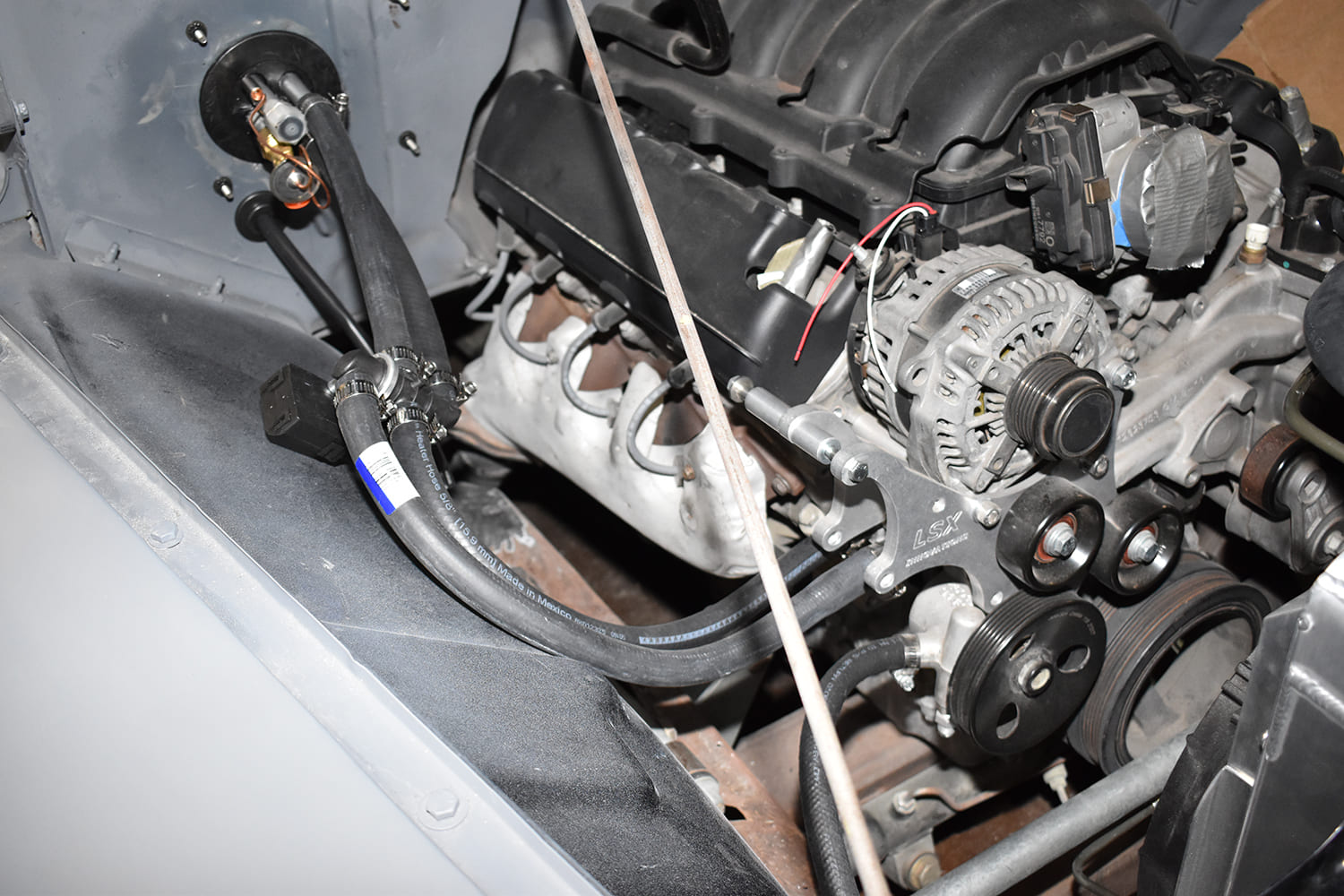 10 1951 Chevy AC heater core lines routed through firewall LSX engine swap