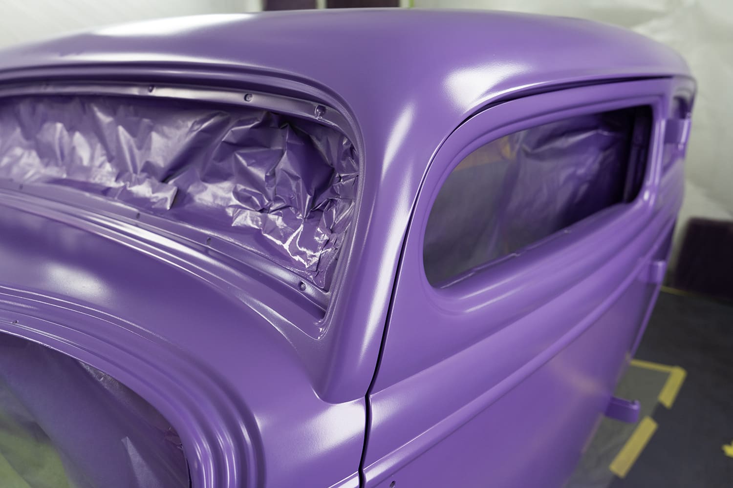 11 1934 Ford sedan rear body freshly painted metallic purple flake in spray booth