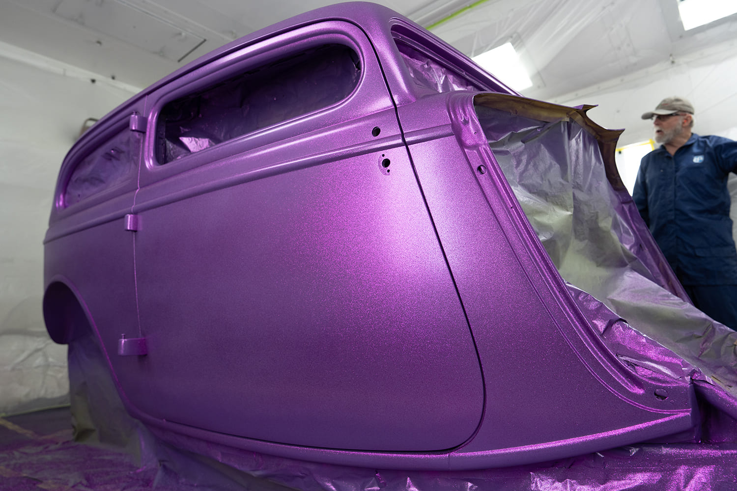 15 1934 Ford sedan hot rod masked and painted metallic purple flake in booth