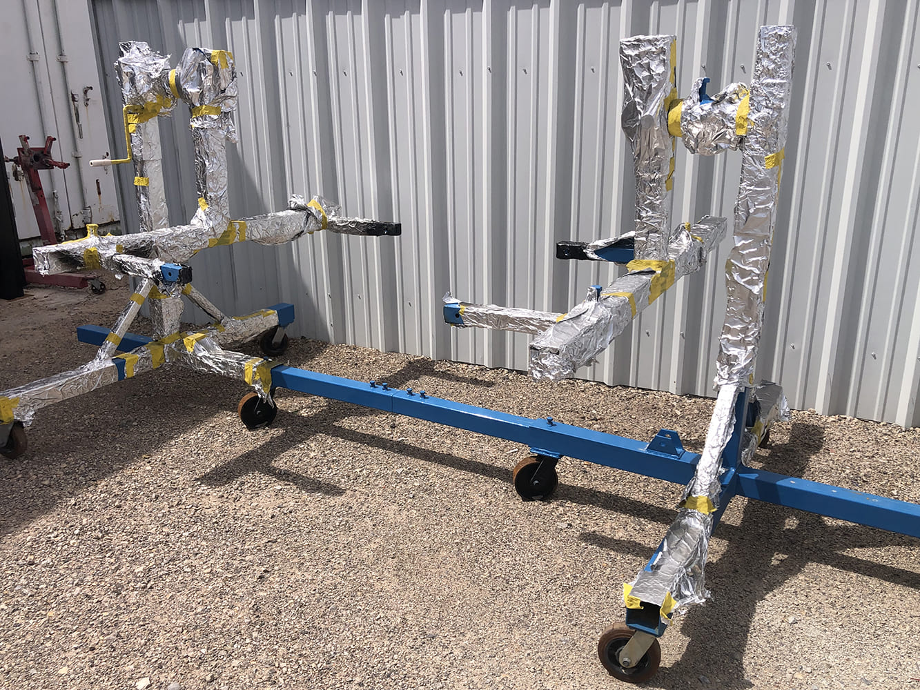 16 Engine stands fully wrapped in aluminum foil for masking before POR 15 coating