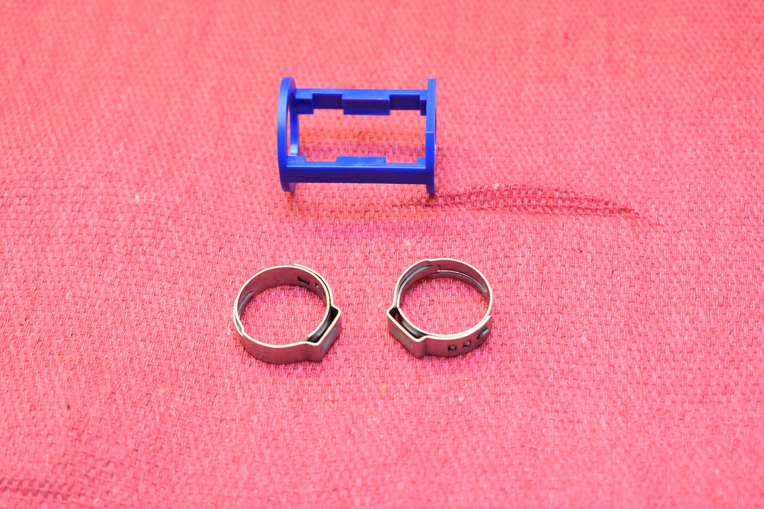 18 1951 Chevy AC hose blue spring lock clip with Oetiker clamps close up