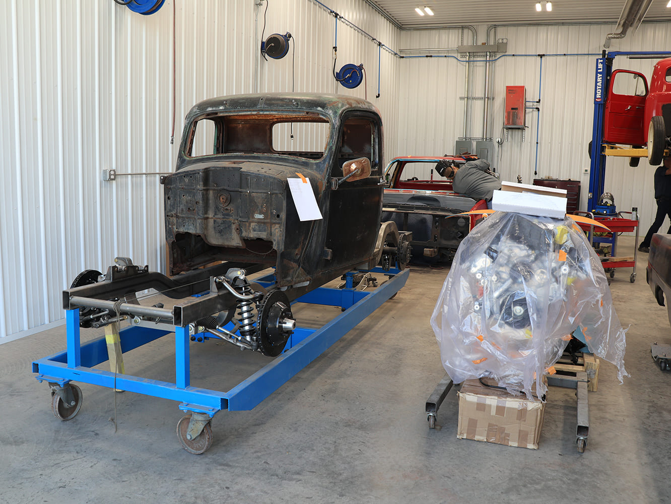 18 Classic truck cab on custom blue cart with suspension mockup and shop restoration layout