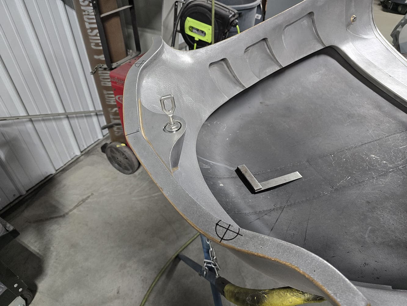 19 1951 Chevy hood underside custom latching mechanism raw structure with layout marks