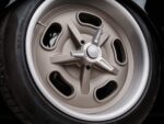 20 1952 Chevy Suburban wheel closeup five spoke alloy center spinner Chevy bowtie logo tire sidewall text