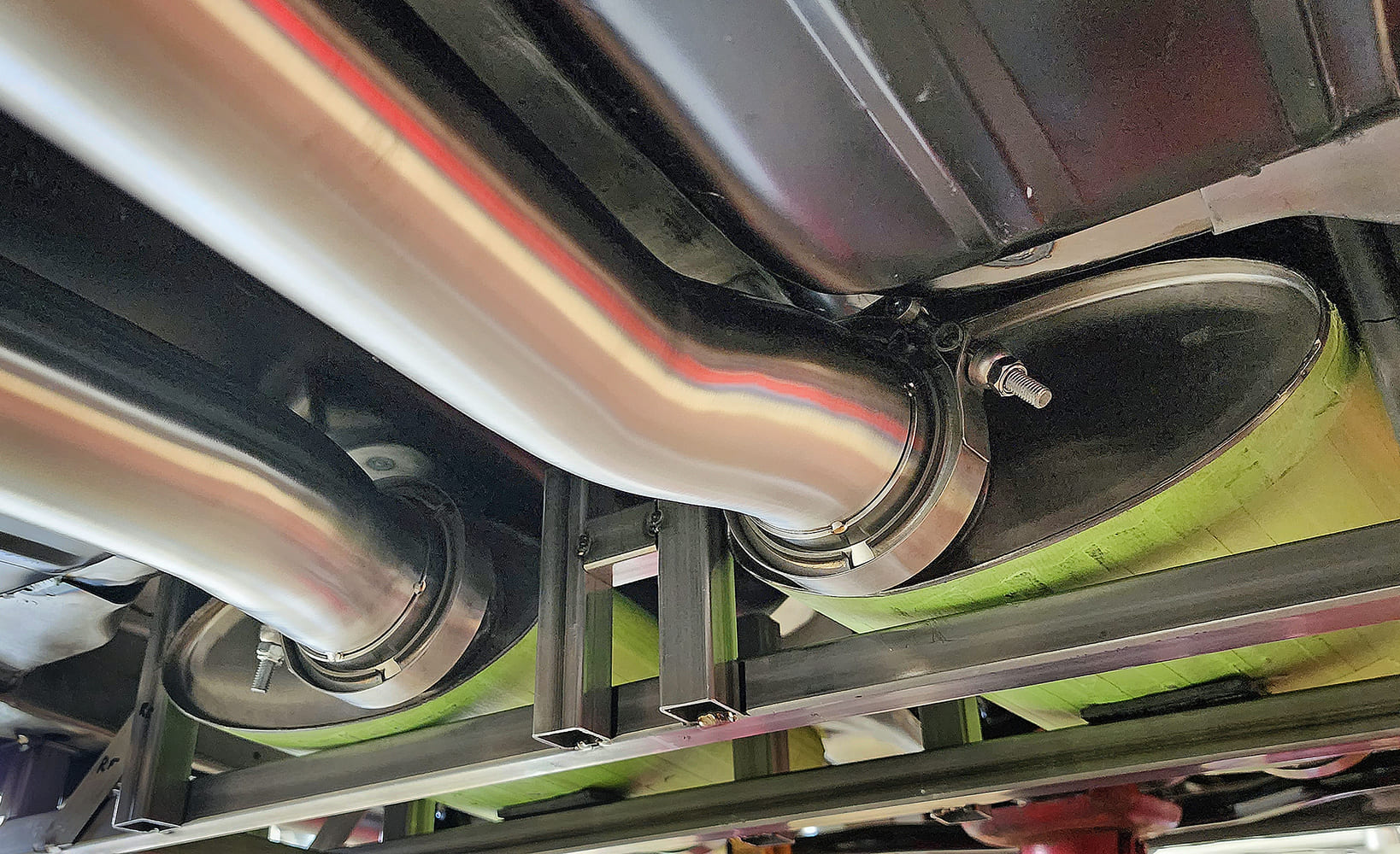 20 Under car exhaust routing dual pipes muffler positioning V band connections square supports