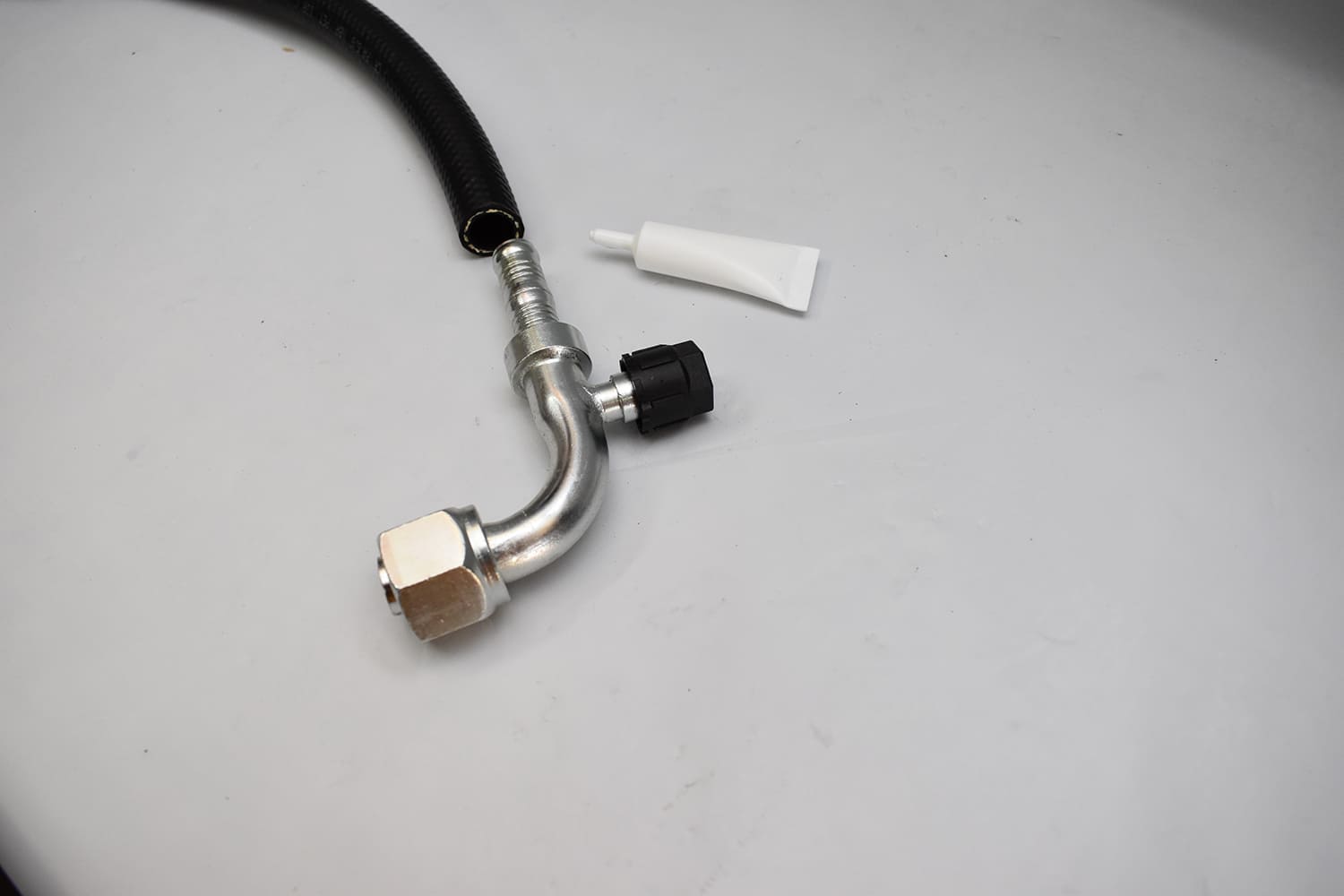 22 1951 Chevy AC hose end lube prep barb fitting with plastic cap and sealant