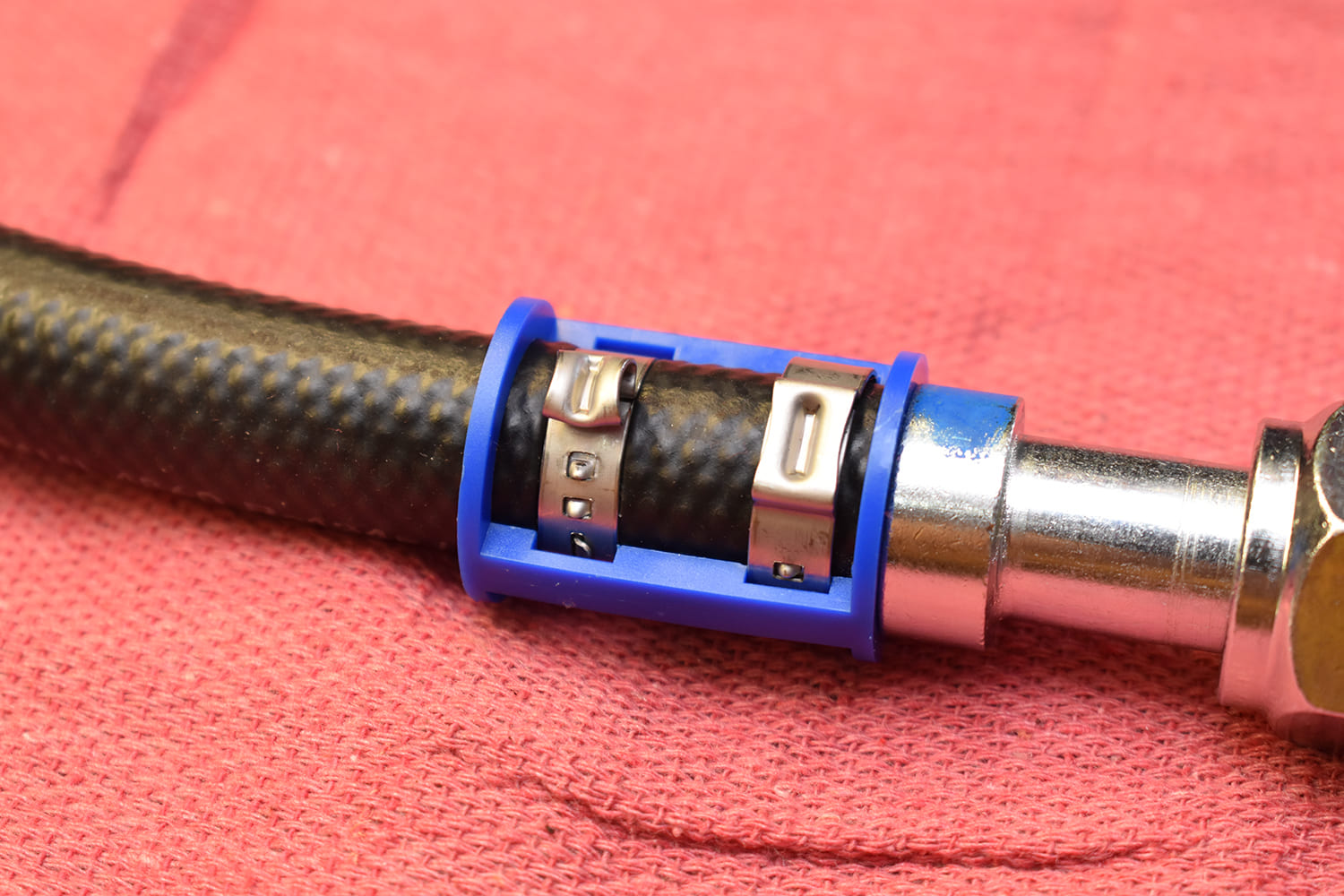 23 1951 Chevy AC hose Oetiker double clamp install with blue clip retainer detail