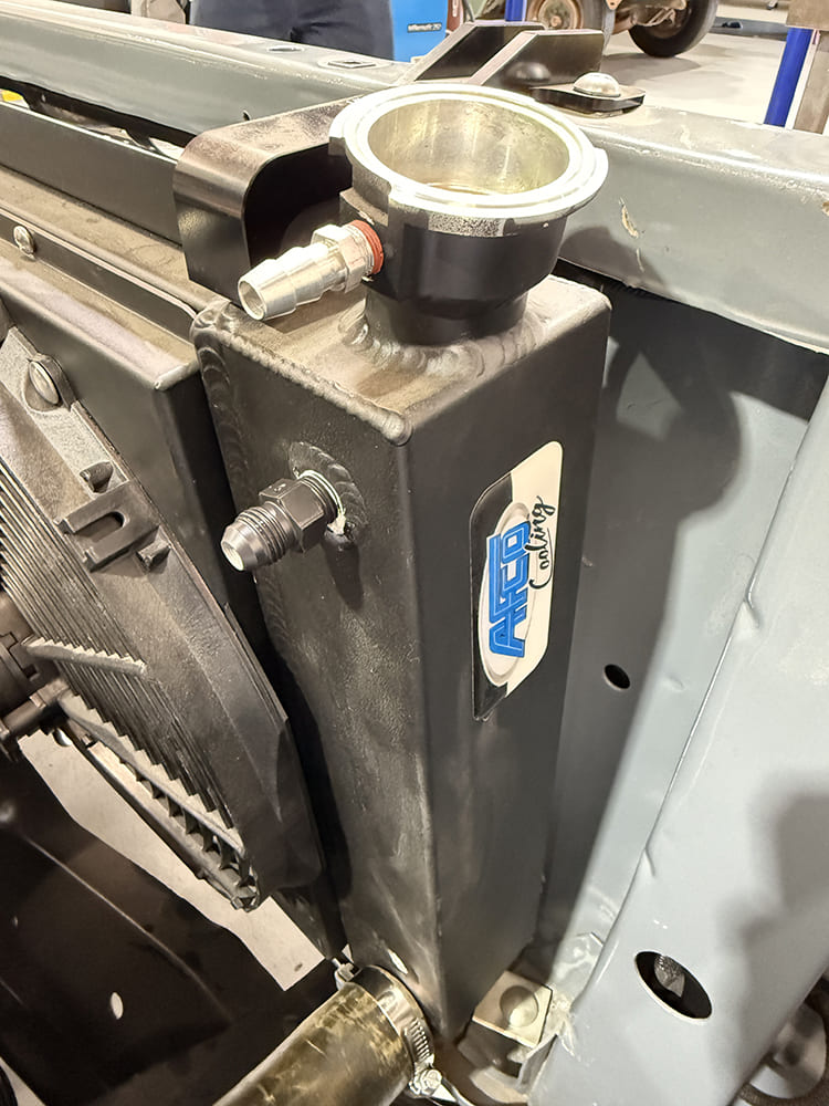 26 AFCO radiator top view showing inlet fittings and trans cooler ports