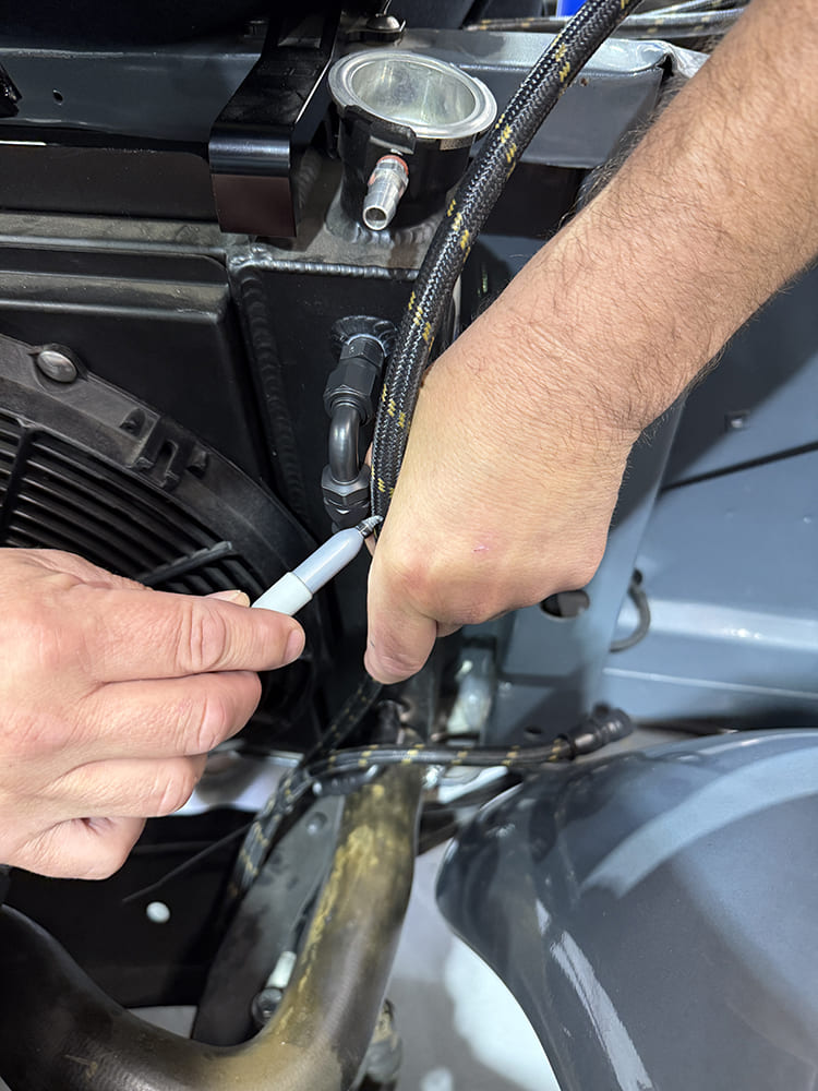 28 Marking braided line for length adjustment with sharpie during layout