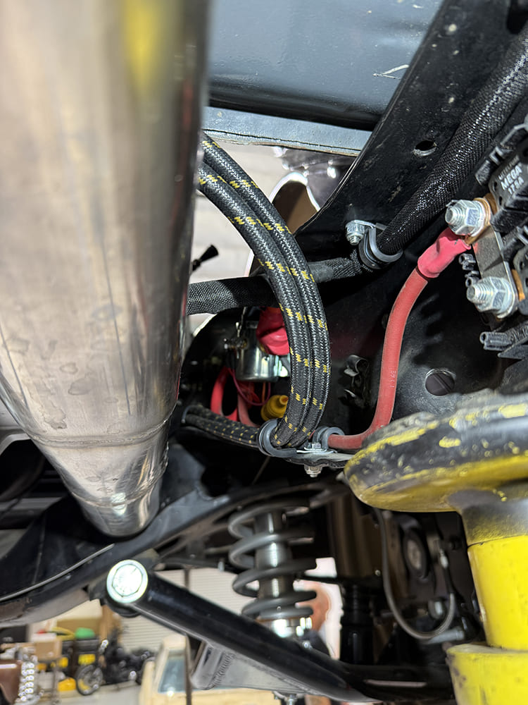 31 Braided transmission lines secured with P clamps near frame and wiring