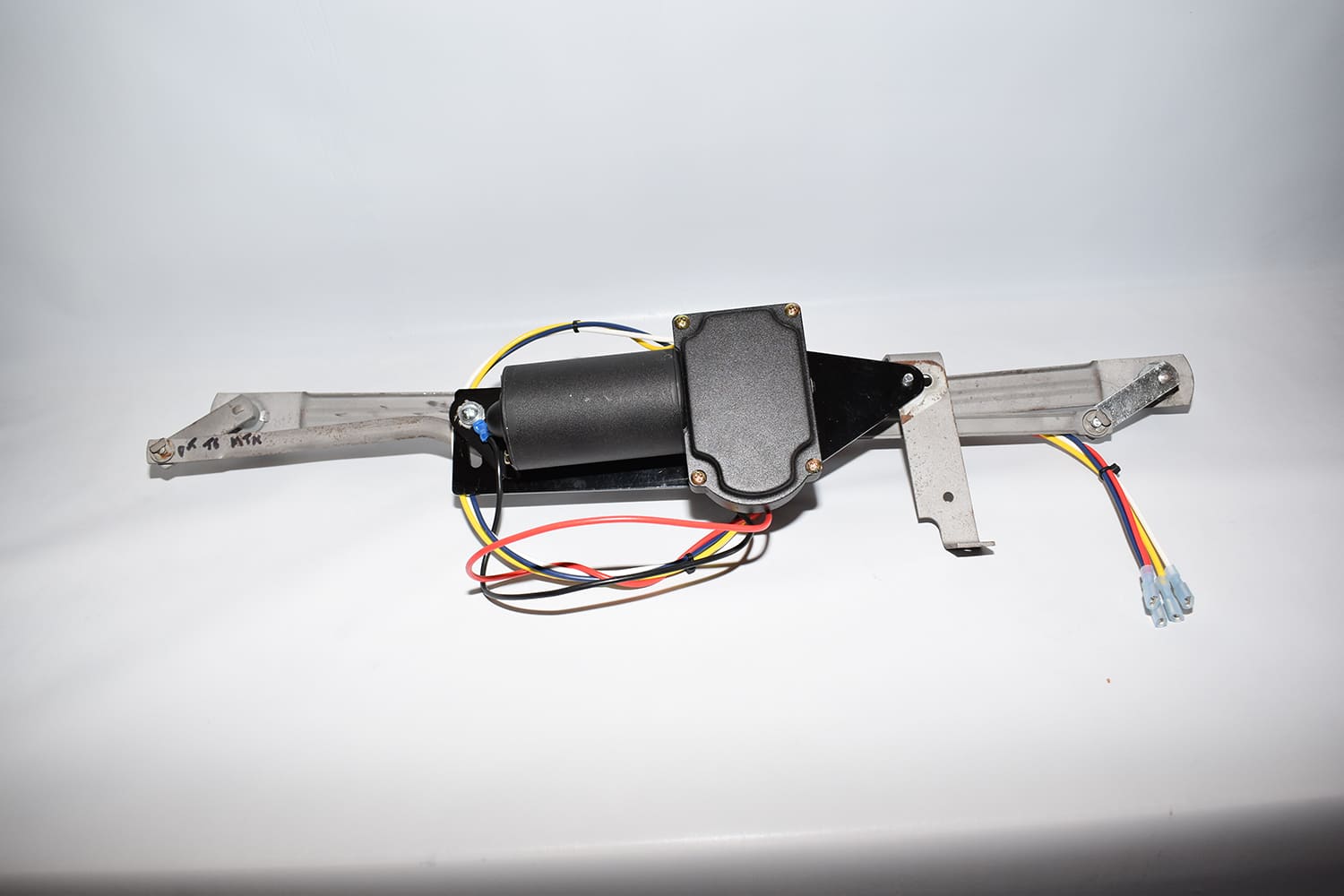 04 Wiper motor bracket with colored wiring installed