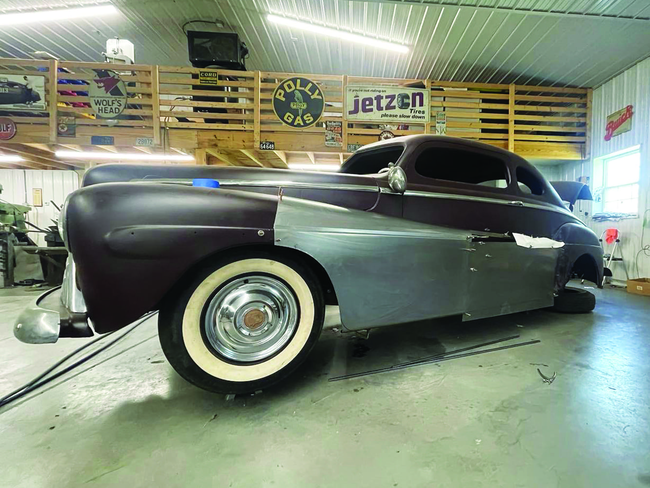 09 1947 Ford coupe paper template on metalwork fadeaway fender shaping in progress