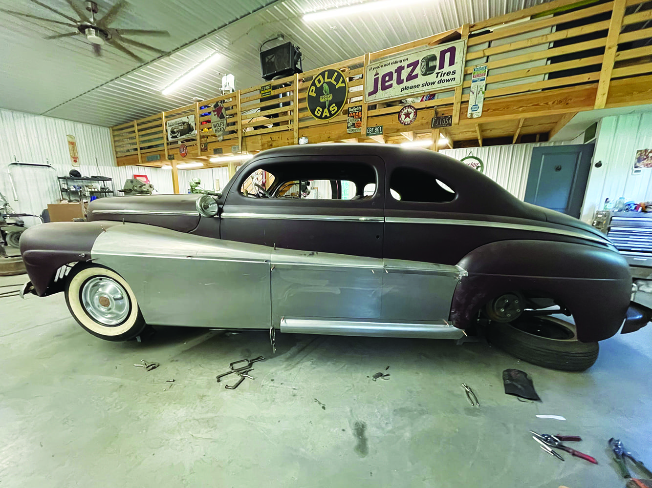 11 1947 Ford coupe custom fadeaway fender metalwork shop with vintage automotive signs