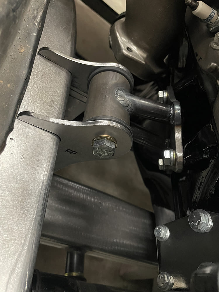 17 Installed fabricated bushing assembly suspension connection bolt and weld detail Chevy C10 chassis