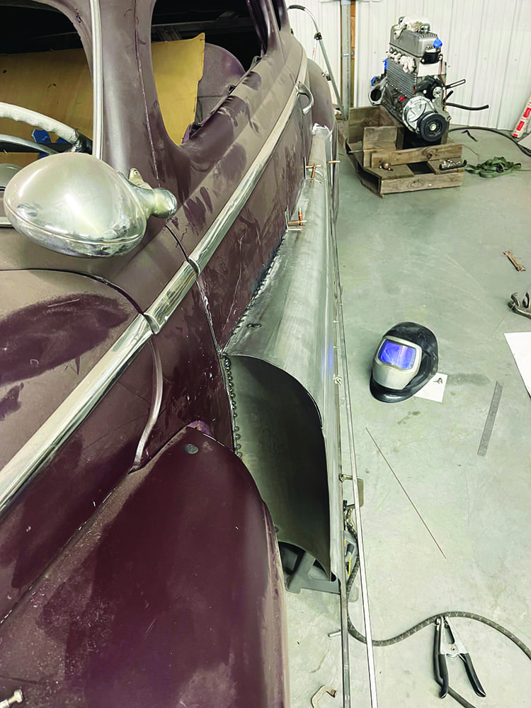 21 1947 Ford coupe custom fadeaway fender panel cleco fasteners welding helmet and tools nearby