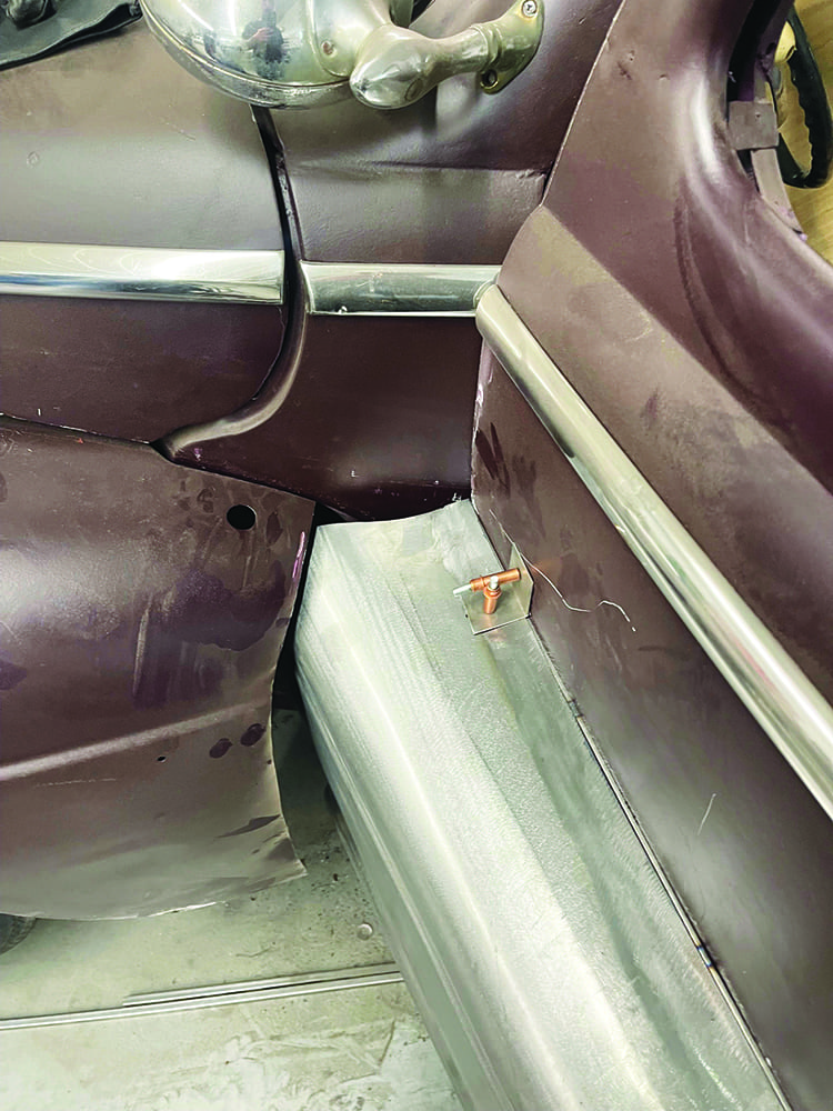 22 1947 Ford coupe close up cleco fastener attaching fadeaway fender panel near door edge