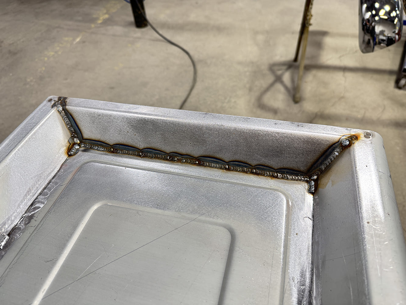 28 Finished inner edge bead uniform scallops clean panel grind marks