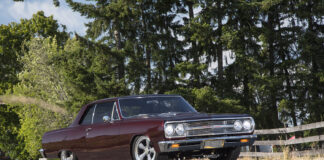 001 1965 Chevrolet Chevelle burgundy restomod parked roadside stance profile